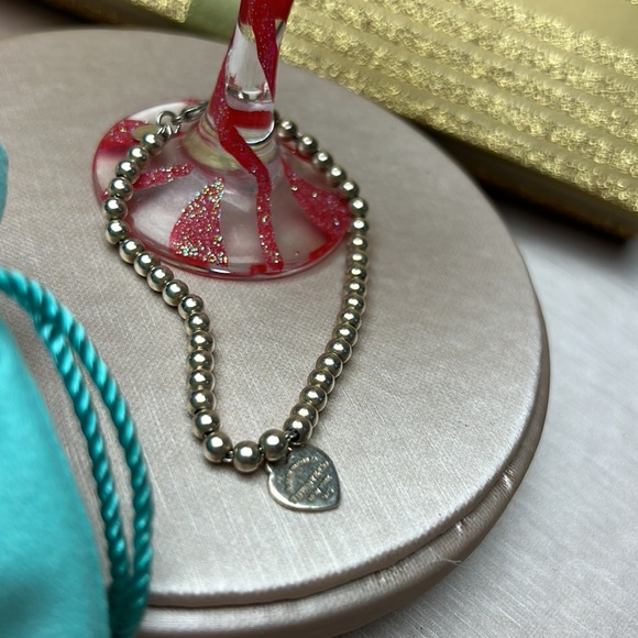 Tiffany & Co. beaded red heart bracelet. Return to Tiffany. # 46 - Picture 2 of 5